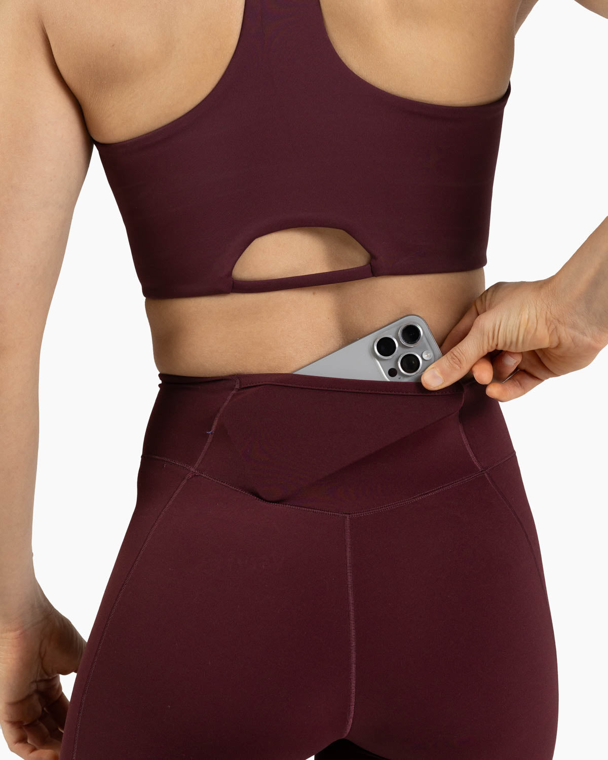 High neck bra Holo Velites female model waist detail color_Pomegranate