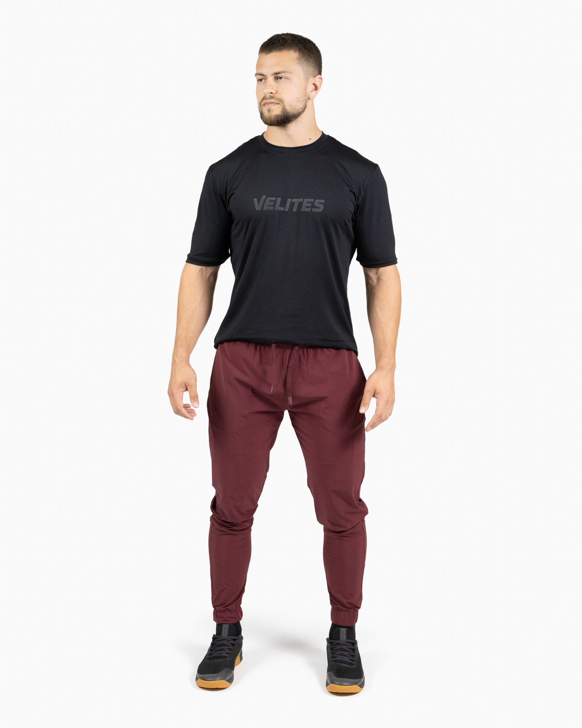 Velites Holo Jogger men front color_Pomegranate