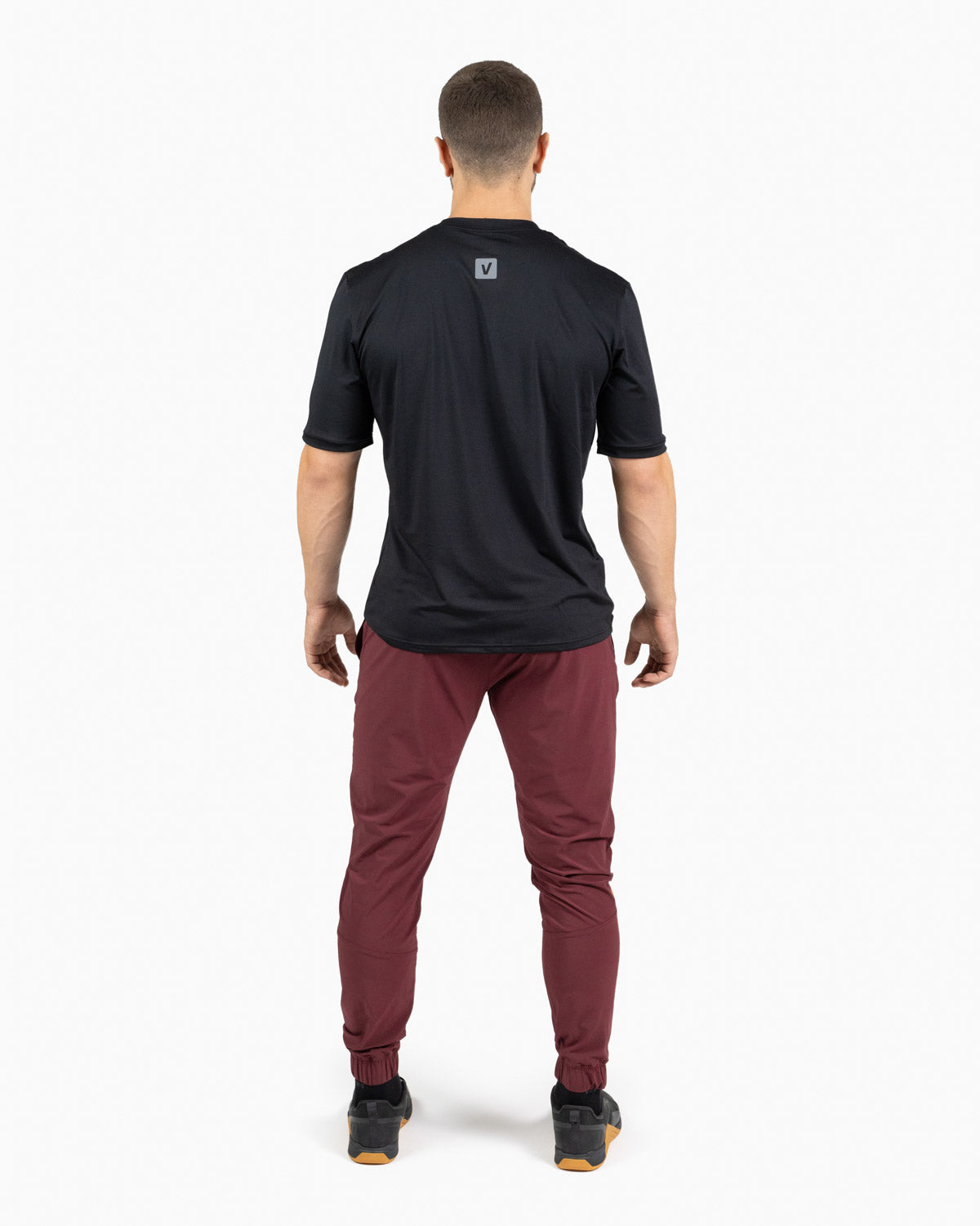 Velites Holo Jogger men back color_Pomegranate